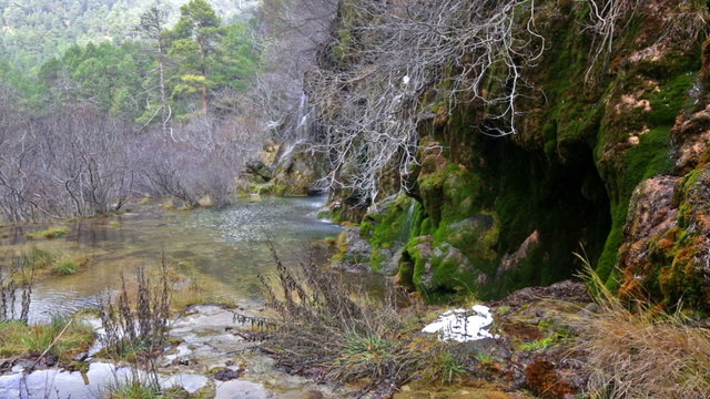 Natural   waterfall at river  in winter. Cuenca, Spain
