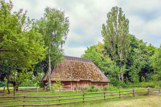 Ukrainian hut thatched sloping field near