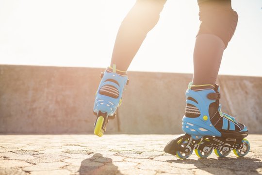 Close up view of inline skates skating