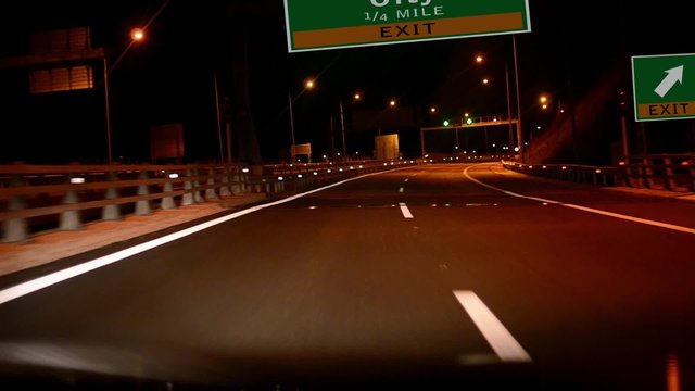 Driving on Highway/interstate at night,  Exit sign of the Oklahoma Ciry, Oklahoma
