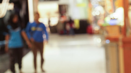 Blur photo of shopping centre with defocused background.
