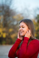 Young woman in autumn park