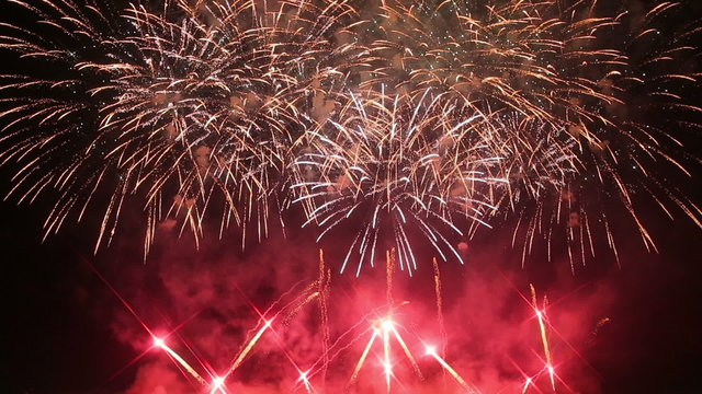 Grandiose celebratory fireworks in the night sky.