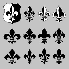 Set of vector heraldic elements - "fleur de lis" in different styles.