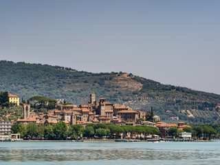 Fototapeta na wymiar Passignano seen from the Trasimeno lakeside in Umbria