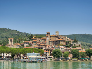 Fototapeta na wymiar Passignano seen from the Trasimeno lakeside in Umbria