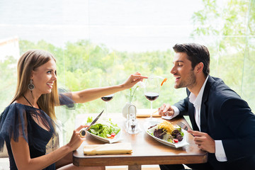 Couple eating in restaurant