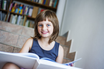 little girl with book
