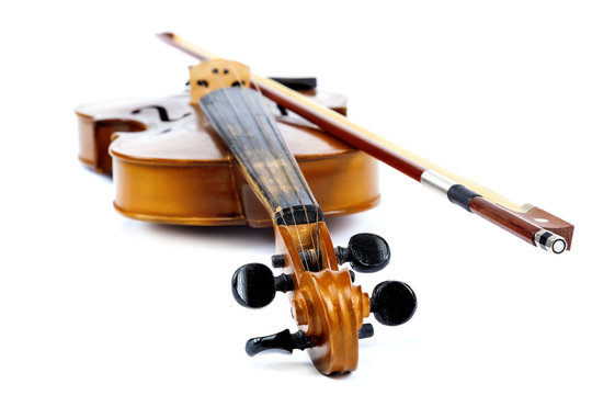Violin and bow on a white background.