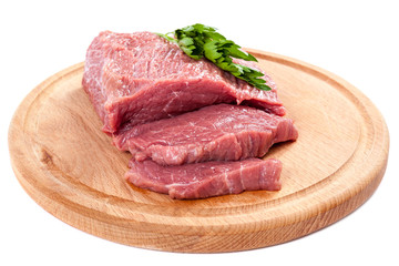 Meat on a cutting board on white background.