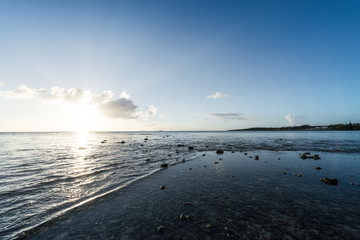 Fototapeta premium Sunset, sunbeam, sky, sea, coast. Okinawa, Japan, Asia.