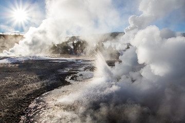 Fototapeta na wymiar chaotic geyser eruptions