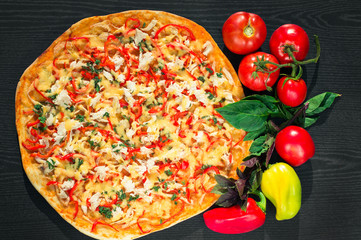 Tasty Italian pizza served on a dark wooden table