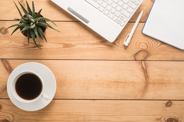 Office table with cup of coffee 
