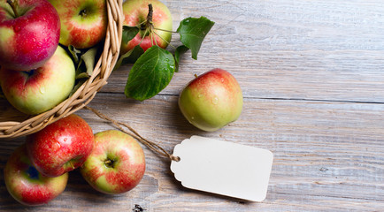 art Ripe red apples on wooden background