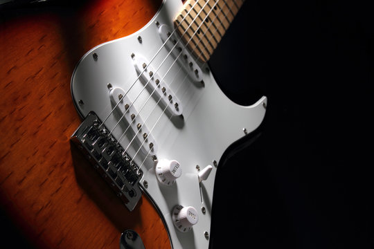 Electric guitar on dark background