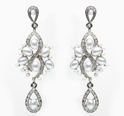 earrings with blue stones on the white
