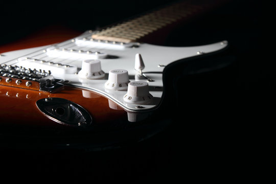 Electric guitar on dark background
