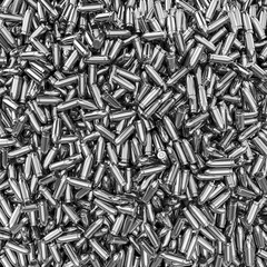 Silver bullets background / 3D render of 9 mm bullets