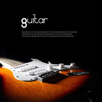 Electric guitar on dark background. Removable sample text.