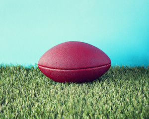 Vintage football over grass - 89991947