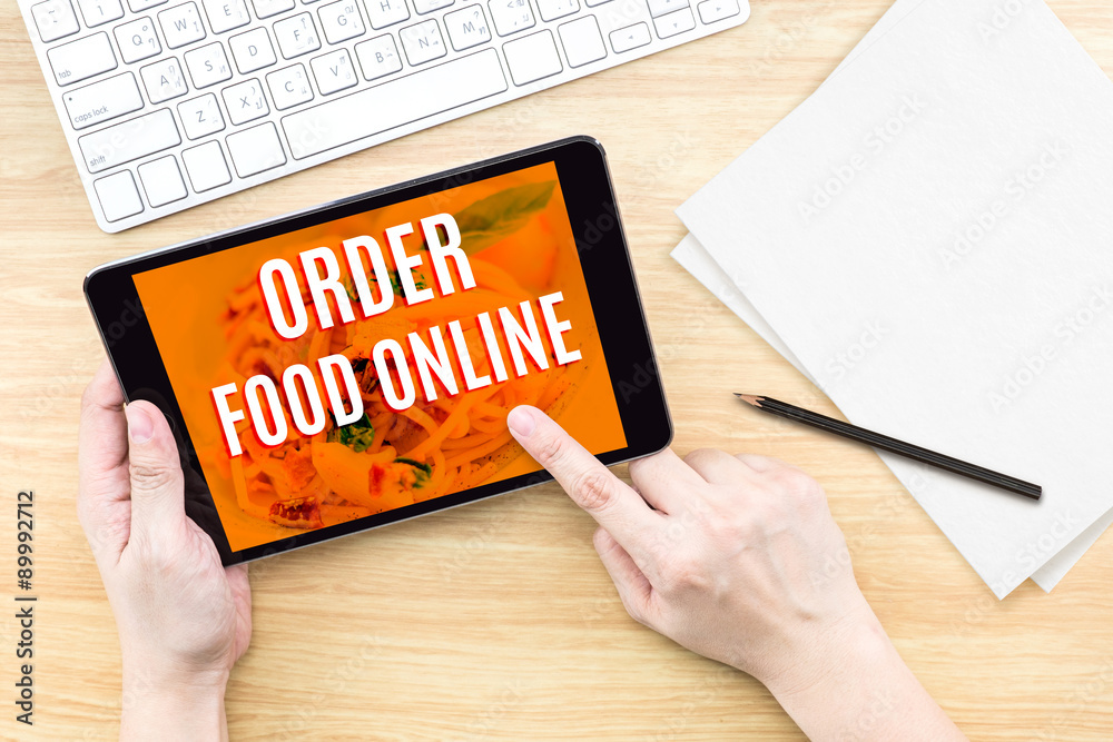 Poster finger click screen with order food online word with keyboard on