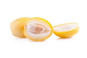 yellow raw dates isolated on white background