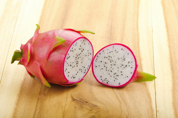 Dragon fruit on wood background