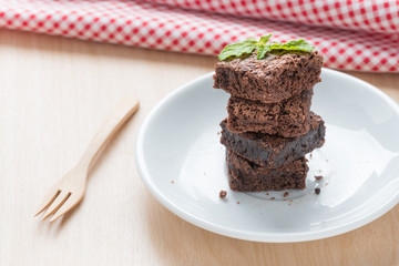 Fototapeta na wymiar Chocolate brownies on white plate.