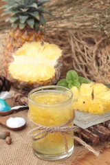 Obraz na płótnie Canvas Pineapple fruit juice and fresh pineapple juicy