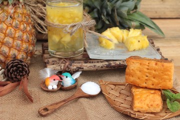 Pineapple juice and fresh pineapple with bread baked with pineap