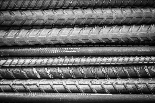 Stack of steel rods texture background in black and white