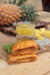 Pineapple juice and fresh pineapple with bread baked with pineap