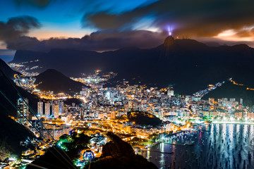 Aerial view over Rio de Janeiro on a hazy night, as viewed from Sugar Loaf peak.