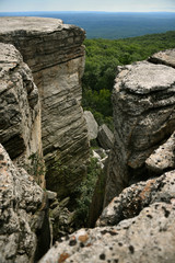 Massive rocks and view to the valley at Minnewaska State Park Reserve Upstate NY during summer time