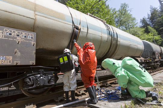 Toxic chemicals acids emergency team train crash