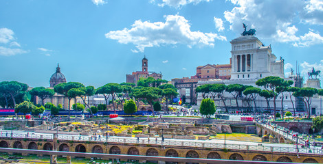 Ruins of Trajan's Forum in Rome, Italy provide magnificient view of vittoriano monument standing nearby.