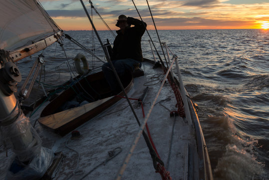 Senior retired sailing Buenos Aires River to Uruguay. Sport free