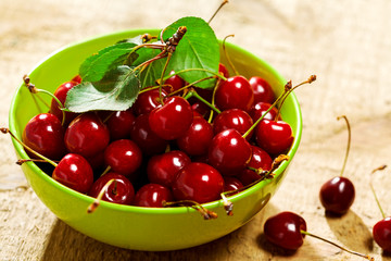 Cherries in bowl on table
