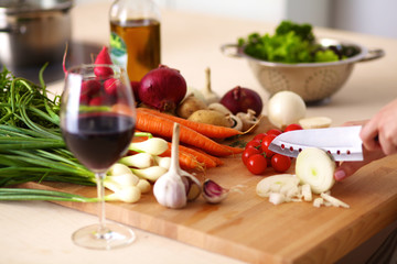 Composition with assorted raw organic vegetables wooden table