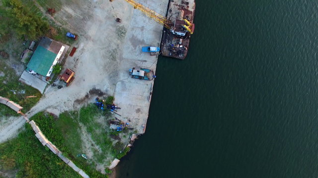 Aerial Survey Quadrocopters of The River With Ships at Sunset. Three Rusty Empty Barge. Phantom 3 Professional, 4K