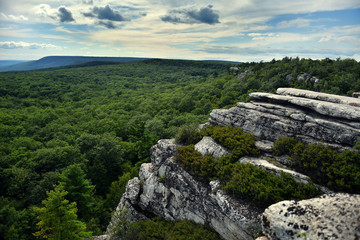Fototapeta na wymiar Massive rocks and view to the valley at Minnewaska State Park Reserve Upstate NY during summer time