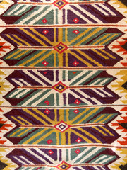 Fototapeta premium Close up of a hanged colourful handmade traditional wool rug
