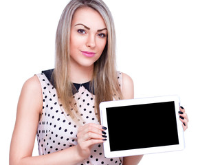 Young cheerful woman is showing blank tablet.