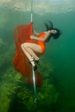 Underwater striptease