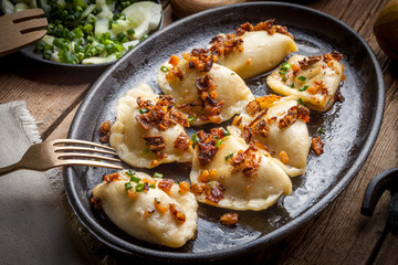Dumplings with meat, onion and bacon. © Arkadiusz Fajer