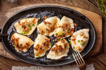 Dumplings with meat, onion and bacon.