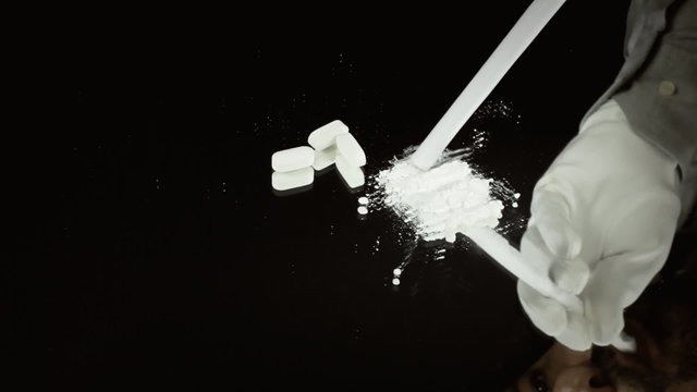 Cocaine and pills on mirror snorting
