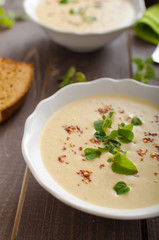 Creamy zucchini soup with chilli and oregano