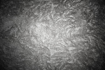 Fototapeta premium Closeup dark concrete wall texture with plaster
